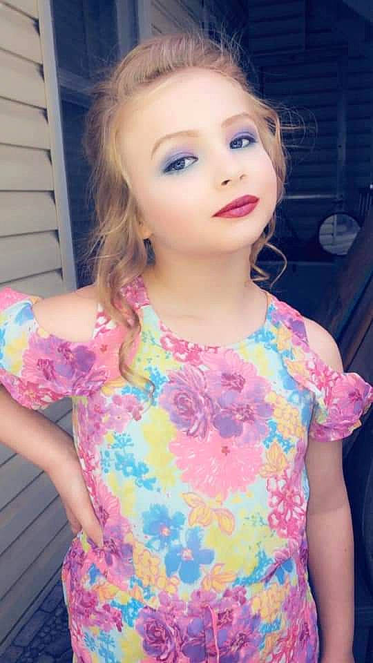 Alissa is registered to the contest to win money with this photo: blue, dress, eye, eyelash, face, fashion, hairstyle, happy, head, iris, joint, lip, neck, organ, outerwear, person, pink, shoulder, skin, sleeve