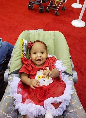 Zahara is registered to the contest to win money with this photo: child, day, fun, infant, person, play, product, sitting, toddler