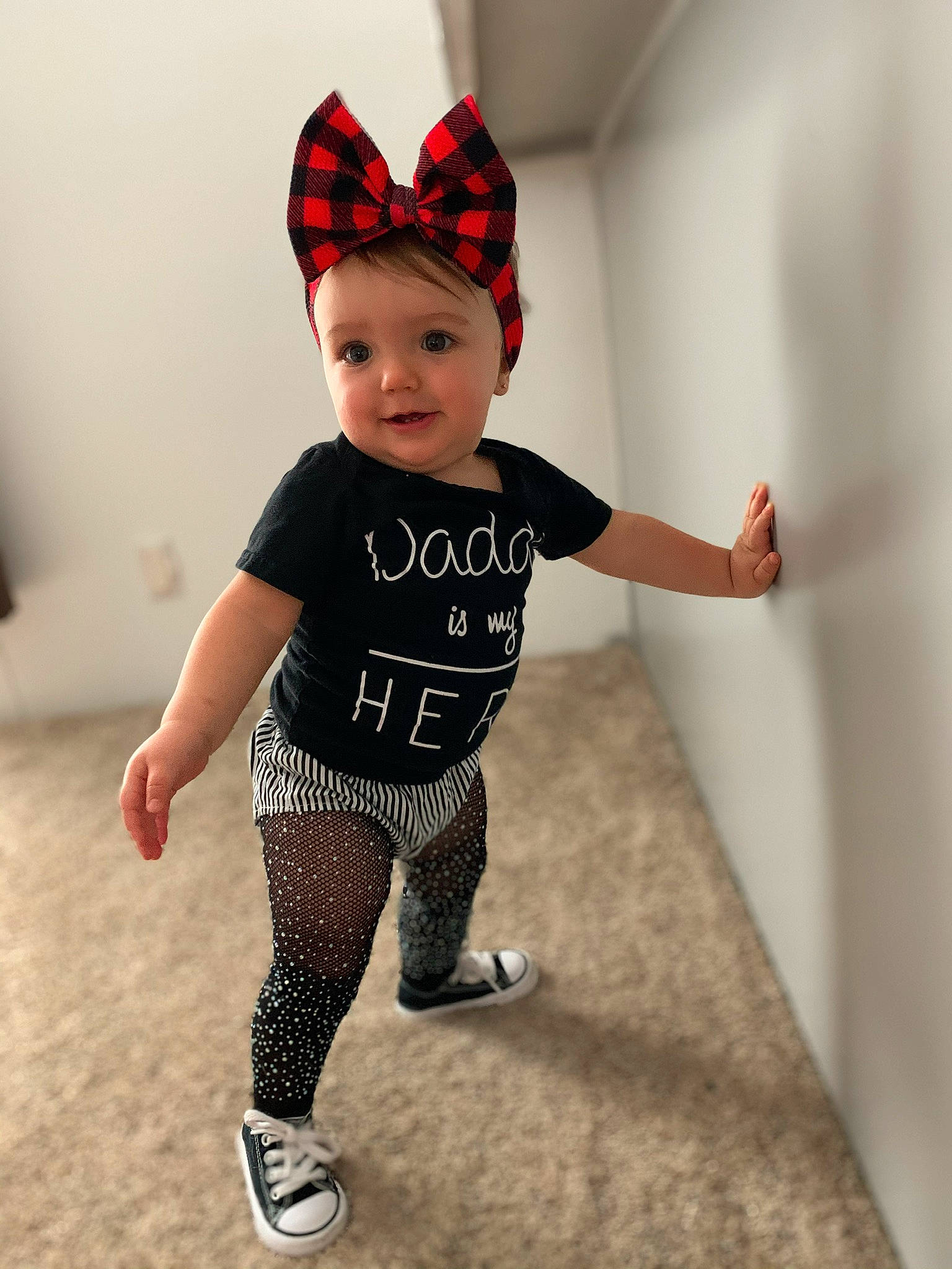 Kylar is registered to the contest to win money with this photo: arm, baby, baby_toddler_clothing, child, clothing, cool, design, headgear, joint, leg, lip, male, person, pink, product, sleeve, sportswear, standing, t_shirt, toddler