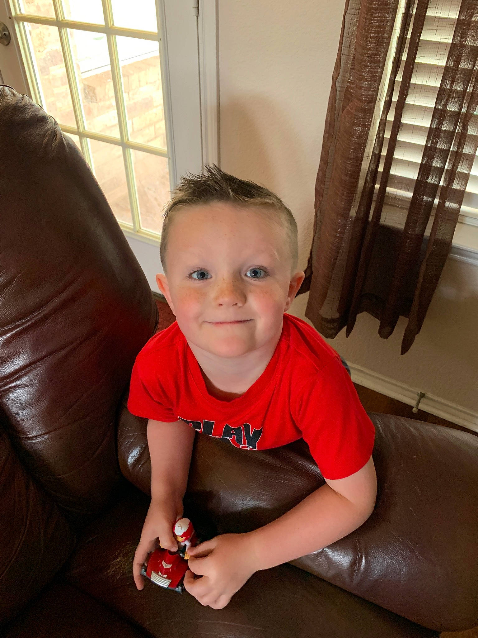 Owen joined the competition — help win amazing prizes! arm, cheek, child, eye, face, fun, furniture, leg, mouth, neck, person, sitting, skin, smile, thigh, toddler, vacation