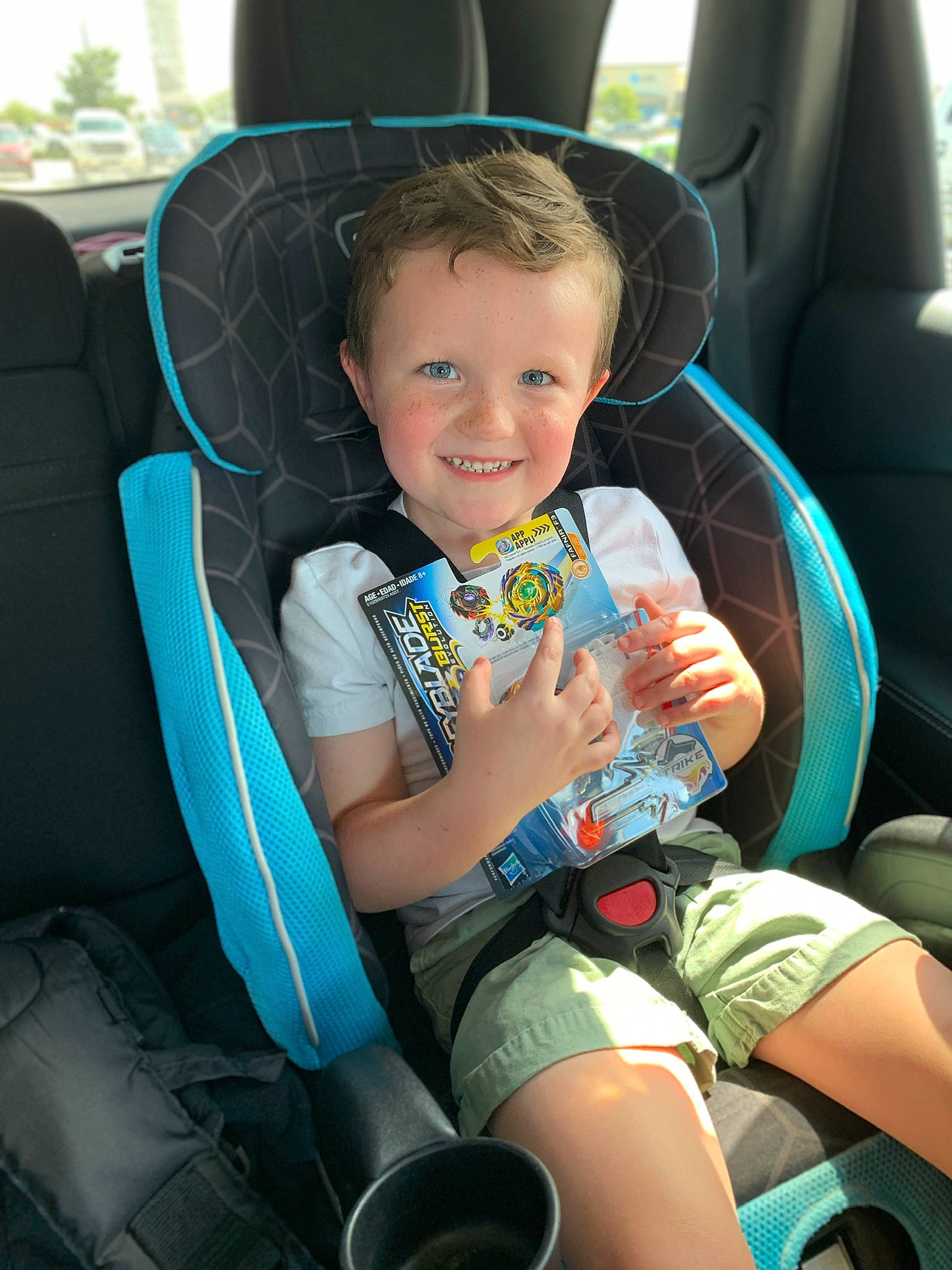 Owen is registered to the contest to win money with this photo: auto_part, baby_in_car_seat, car_seat, car_seat_cover, child, family_car, joy, person, seat_belt, sitting, toddler