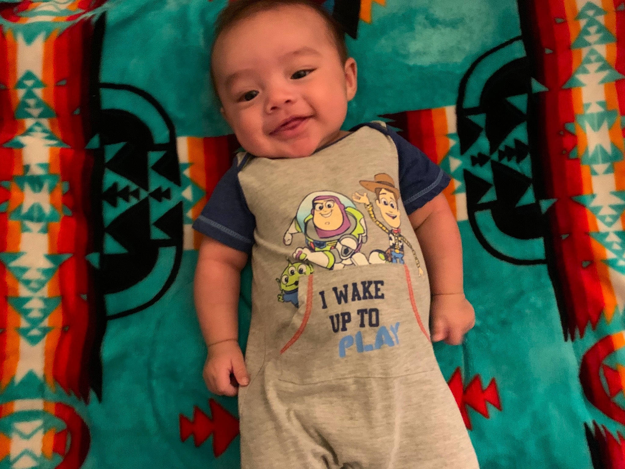 Flynn joined the competition — help win amazing prizes! azure, baby, baby_toddler_clothing, cheek, child, cool, face, fun, green, happy, head, leisure, pattern, people, person, photograph, sleeve, smile, t_shirt, textile