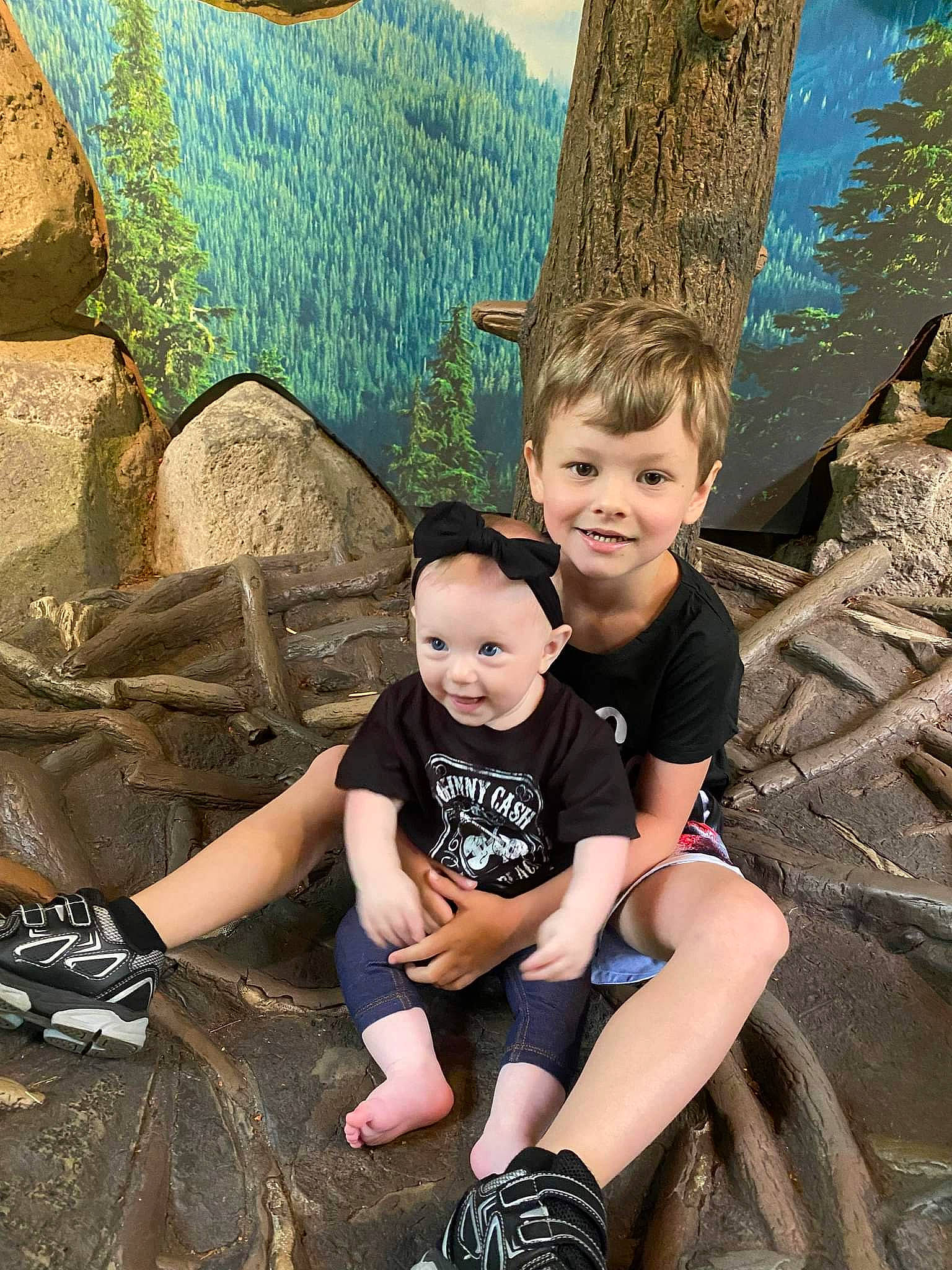 Alaric joined the competition — help win amazing prizes! blue, child, event, flash_photography, fun, grass, happy, joy, landscape, leg, leisure, people_in_nature, person, shoe, shorts, sitting, smile, t_shirt, toddler, travel