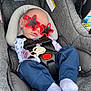 Leo is registered to the contest to win money with this photo: baby, car_seat, sunglasses, red, pacifier, clothing, sleeping, infant, child, seatbelt, fabric, blue_pants, white_socks, head_support, evenflo, cute, resting, accessory, safety, portrait