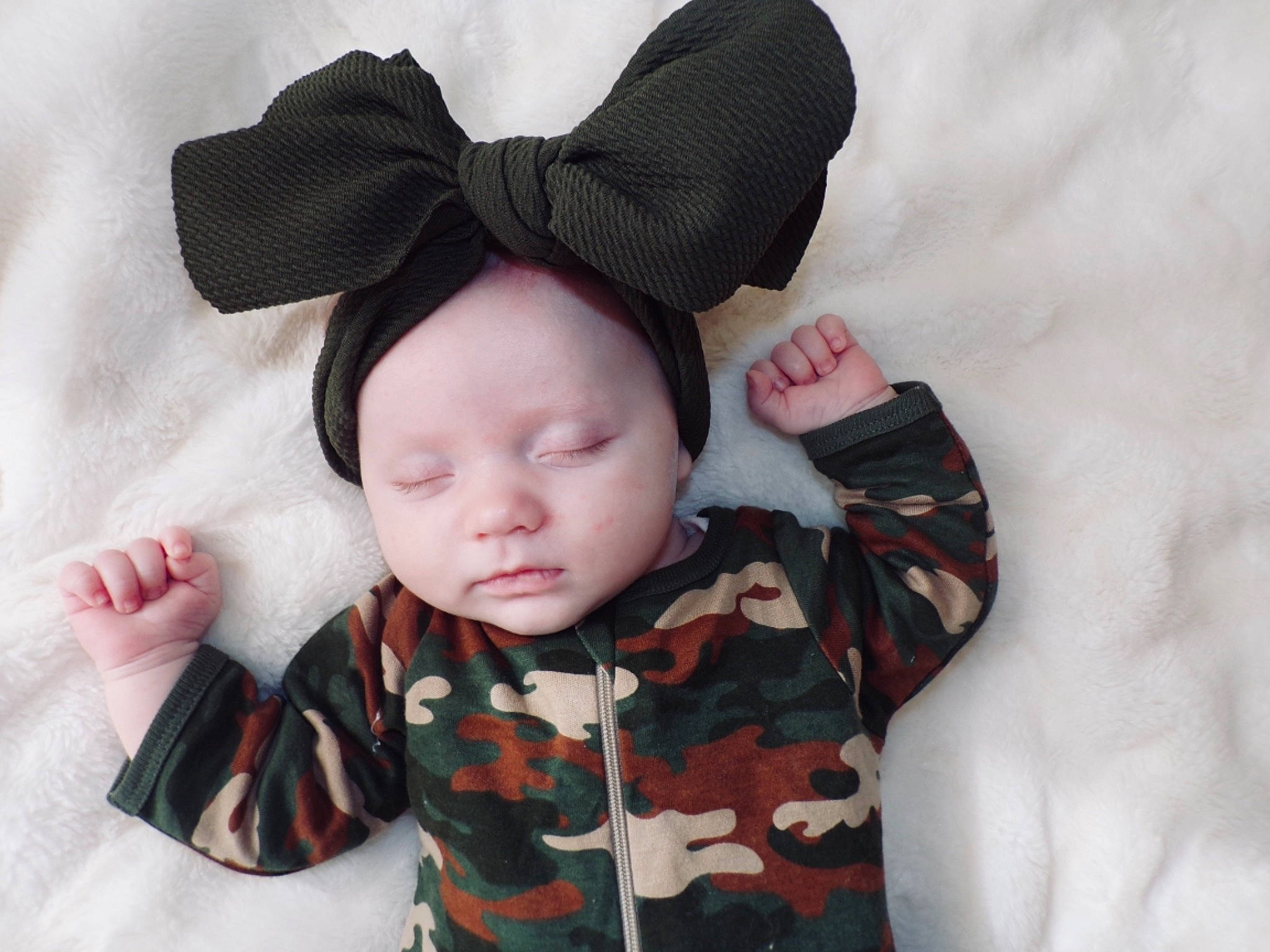 Natalie Rose is registered to the contest to win money with this photo: baby, baby_products, baby_toddler_clothing, bonnet, cheek, child, comfort, cool, costume_accessory, costume_hat, headgear, headwear, hood, human, pattern, person, portrait_photography, sleeve, snow, toddler