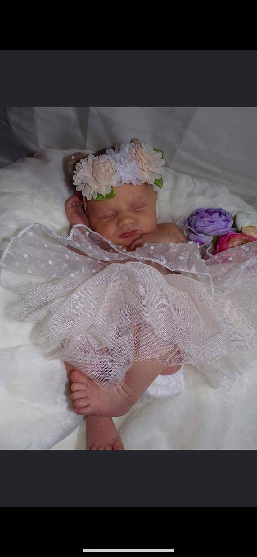 Natalie is registered to the contest to win money with this photo: baby, bridal_accessory, bridal_clothing, child, costume, dress, hair_accessory, headpiece, headwear, person, pink, toddler, wedding_dress