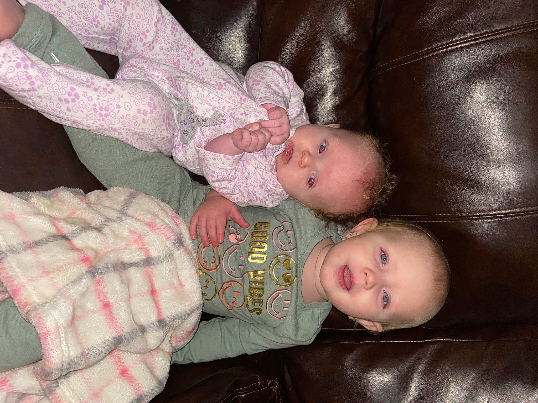 Natalie Isabelle is registered to the contest to win money with this photo: baby, baby_products, baby_toddler_clothing, brown, cheek, child, comfort, eye, finger, human_body, iris, lap, nail, pattern, person, room, skin, sleep, textile, toddler