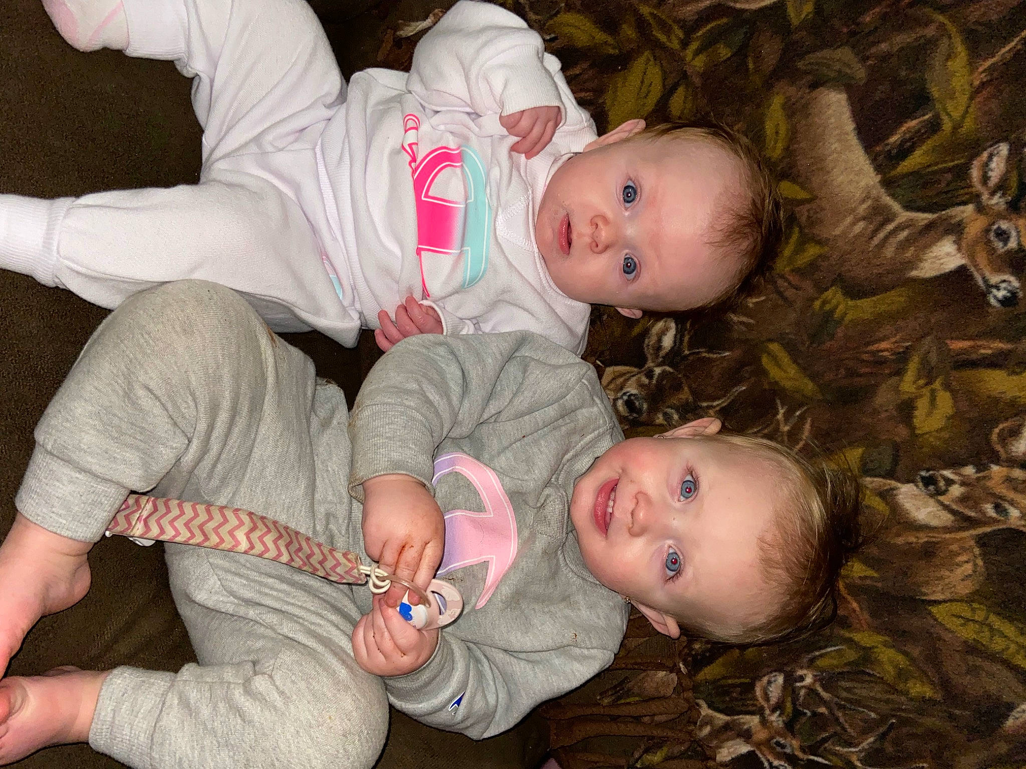 Natalie Isabelle is registered to the contest to win money with this photo: baby, baby_toddler_clothing, cheek, comfort, eye, face, finger, fun, grass, hand, happy, head, iris, joy, mouth, organ, person, skin, smile, toddler