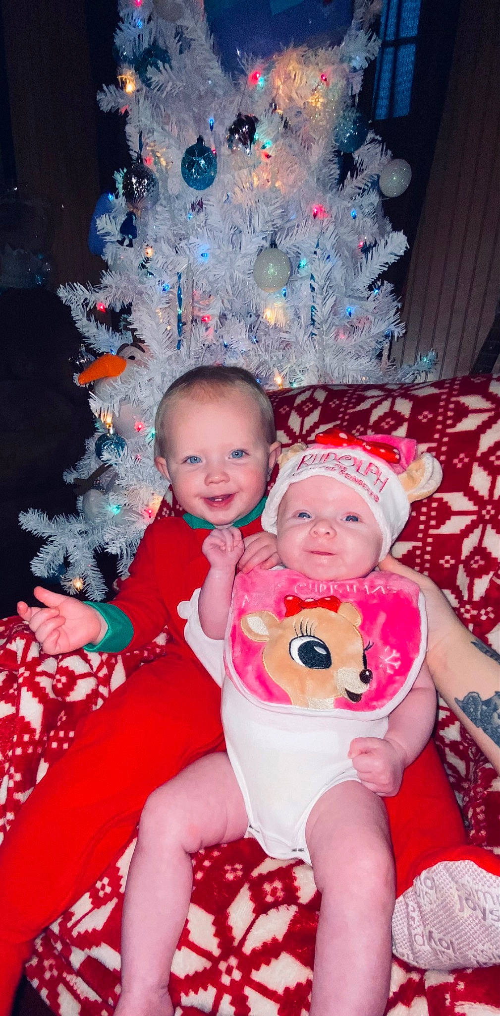 Natalie Isabelle joined the competition — help win amazing prizes! baby, baby_toddler_clothing, child, christmas, christmas_decoration, christmas_ornament, christmas_tree, fun, happy, headwear, holiday_ornament, human_body, joy, lap, ornament, person, pink, playing_with_kids, red, skin