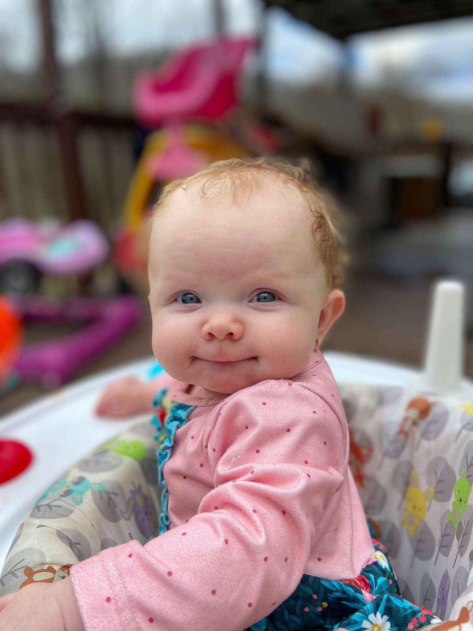 Isabelle is registered to the contest to win money with this photo: baby, baby_toddler_clothing, beauty, cheek, child, dress, event, facial_expression, fun, hairstyle, happy, head, iris, leisure, person, pink, sitting, skin, sleeve, smile