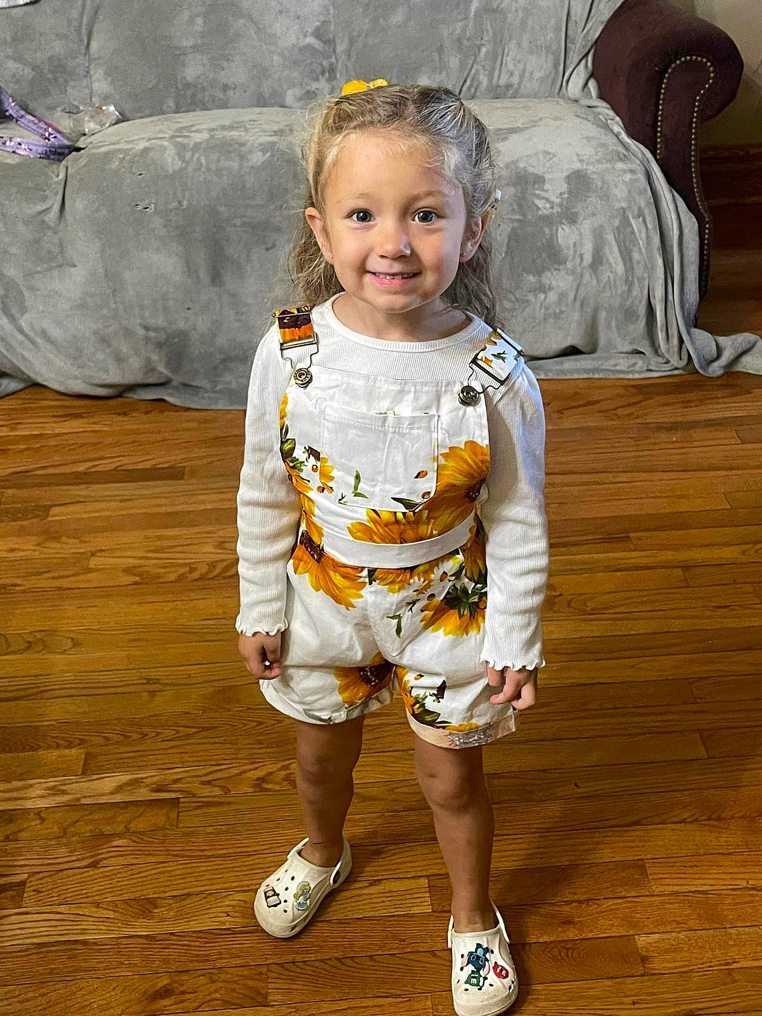 Arayah is registered to the contest to win money with this photo: baby_toddler_clothing, child, eye, face, fashion_design, floor, flooring, fun, happy, hardwood, human_leg, joy, knee, pattern, person, sleeve, smile, sportswear, standing, toddler