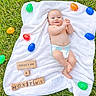 baby, infant, smiling, diaper, blanket, grass, outdoor, easter_eggs, colorful, wooden_blocks, baby_toys, happy, clapping, cute, child, portrait, laying_down, nature, playful, young_child