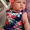 Ellieana joined the competition — help win amazing prizes! baby, infant, headband, bow, floral_outfit, purple_blanket, chubby_cheeks, indoor, furniture, wooden_drawer, soft_texture, cute, portrait, child, person, skin, sitting, gazing, comfort, young