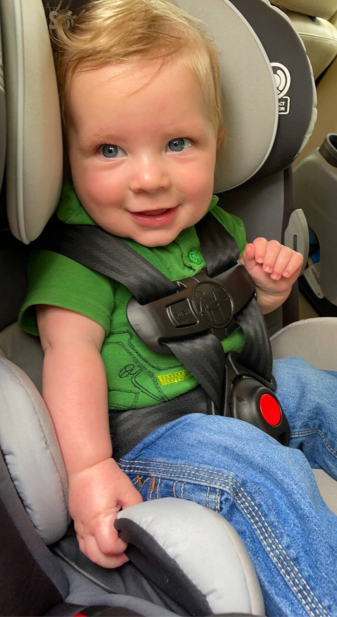 Corbyn is registered to the contest to win money with this photo: auto_part, baby, baby_in_car_seat, baby_toddler_clothing, car_seat, cheek, child, comfort, denim, finger, happy, joy, person, product, seat_belt, sitting, skin, smile, thumb, toddler