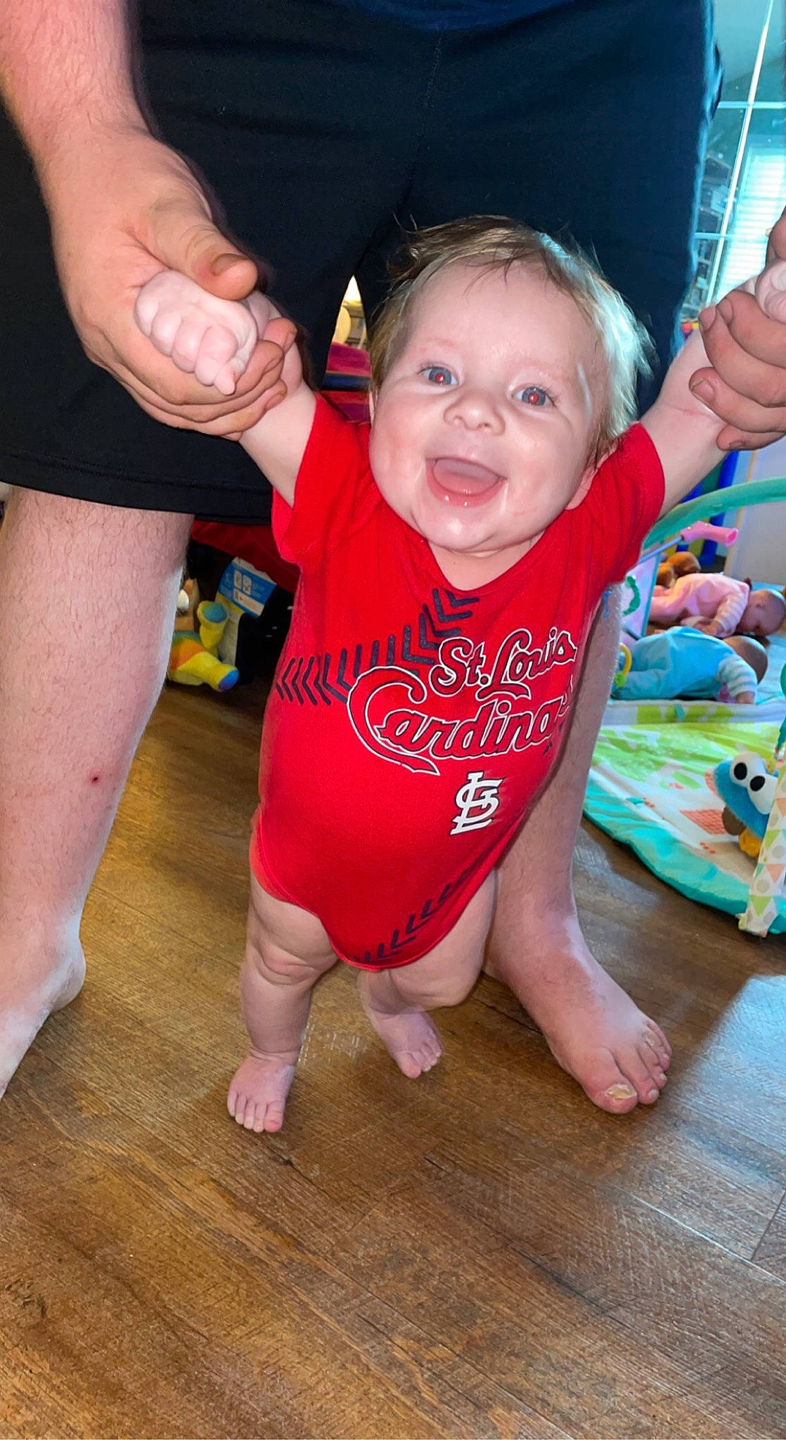 Corbyn joined the competition — help win amazing prizes! baby_toddler_clothing, child, event, finger, flooring, foot, fun, gesture, hand, happy, human_leg, leg, person, pink, skin, sleeve, smile, sock, thigh, thumb