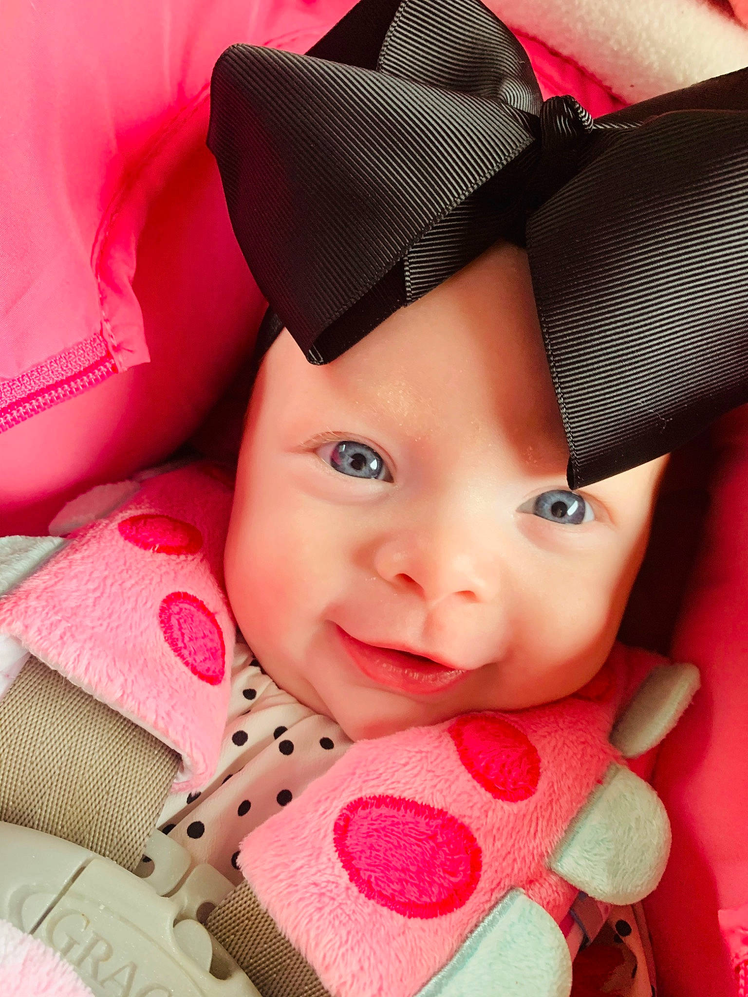 Kenzleigh is registered to the contest to win money with this photo: baby, beauty, cheek, child, child_model, eye, face, fashion_accessory, happy, hat, head, headgear, lip, mouth, pattern, person, pink, skin, smile, textile