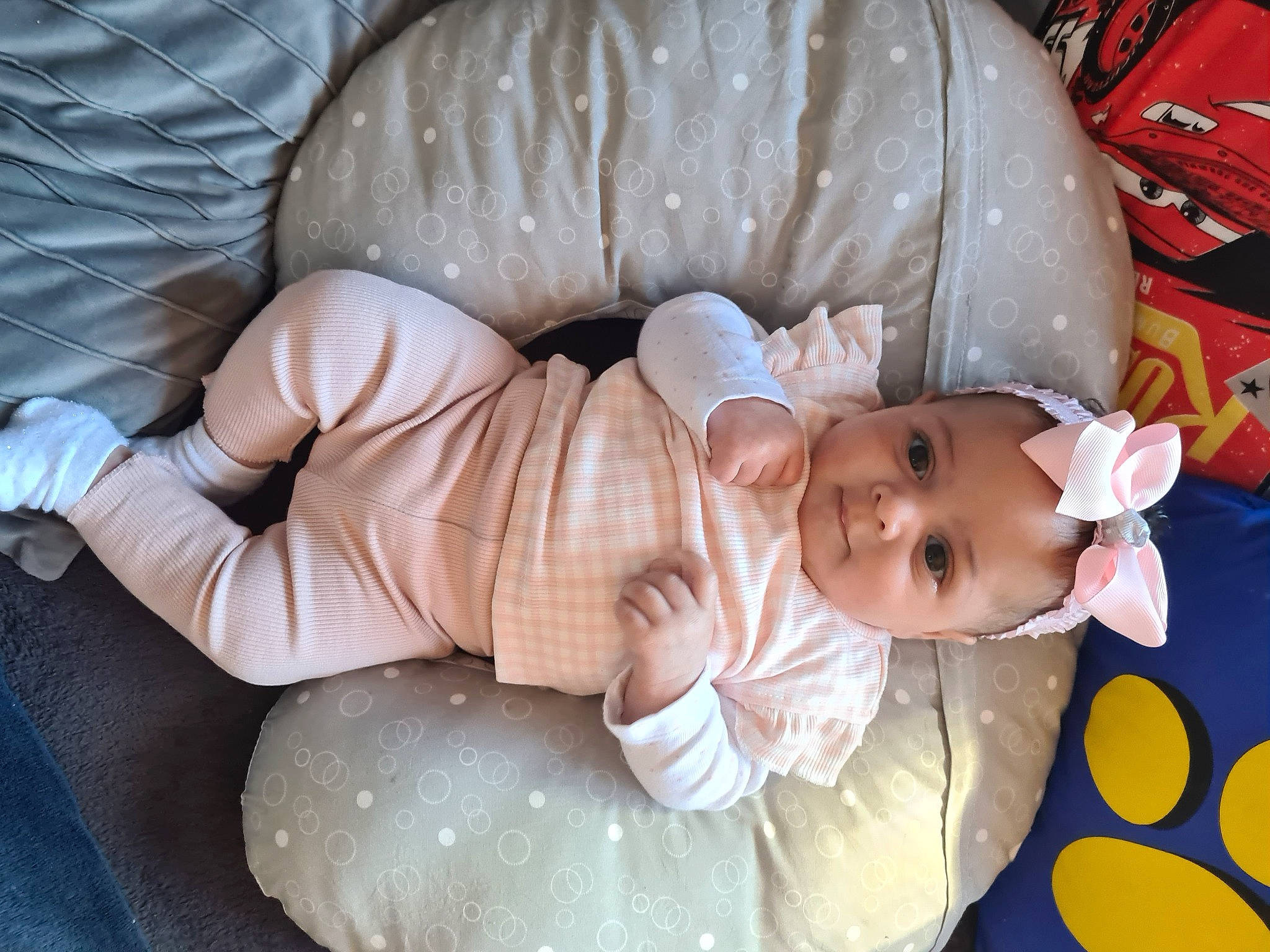 Mia participe au concours pour gagner de l'argent avec cette photo : baby, baby_products, baby_sleeping, baby_toddler_clothing, cheek, child, comfort, head, human_body, lap, linens, nap, orange, person, room, sitting, skin, sleep, sleeve, toddler