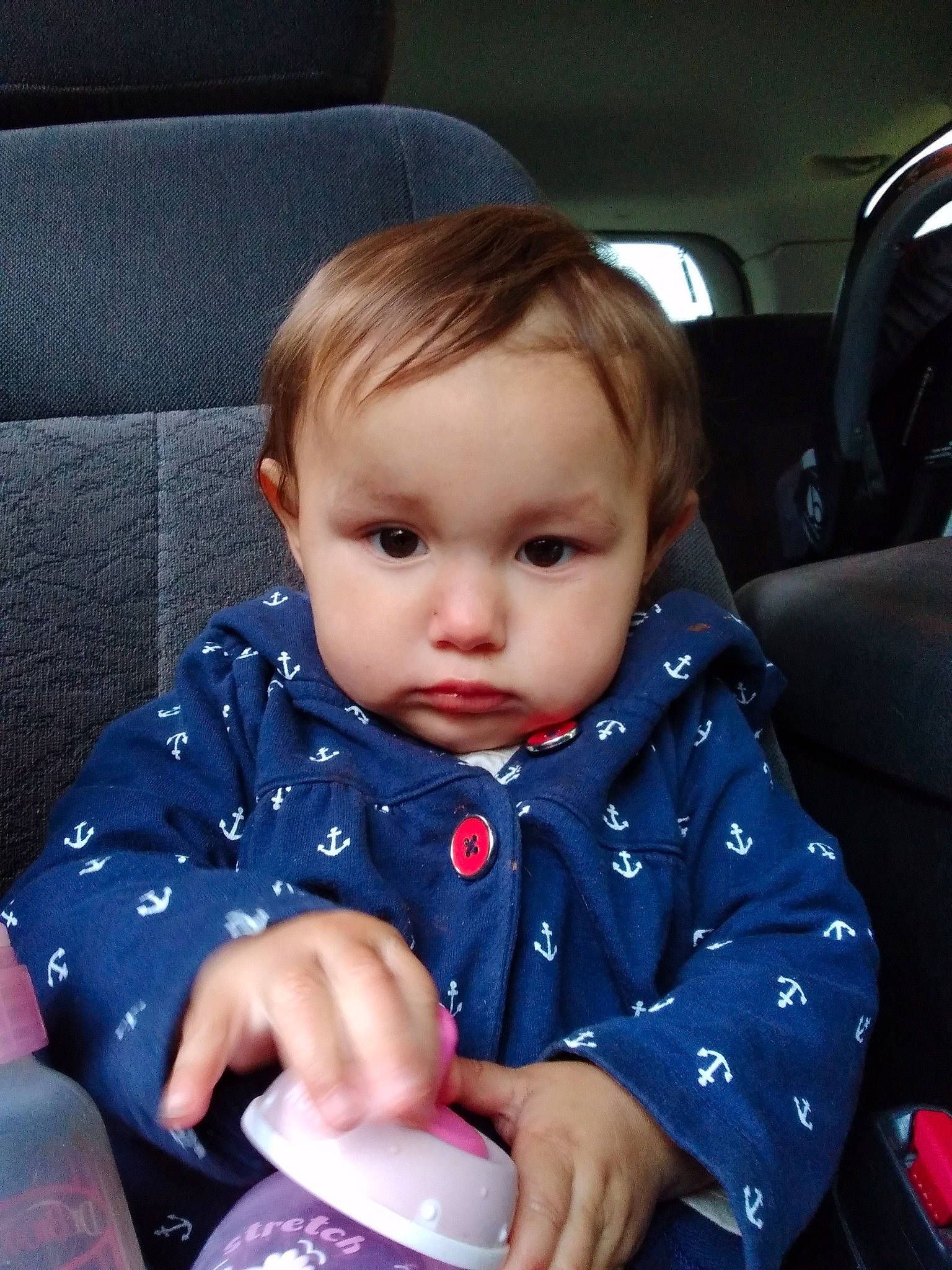 Luciana is registered to the contest to win money with this photo: baby, baby_in_car_seat, car_seat, cheek, child, person, sitting, skin, toddler
