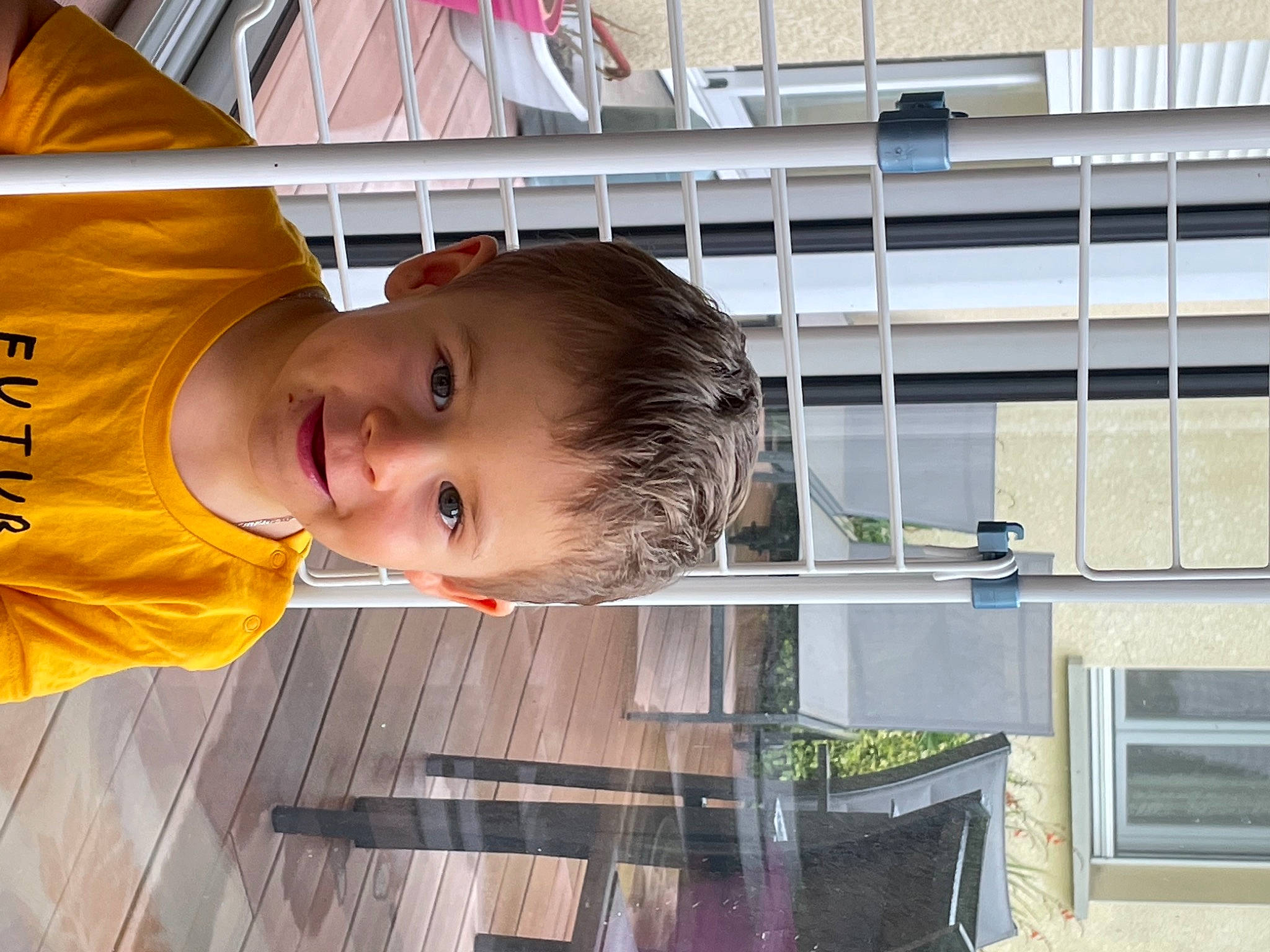 Sloan participe au concours pour gagner de l'argent avec cette photo : baby, baby_toddler_clothing, child, chin, flooring, fun, hairstyle, happy, hardwood, joy, leisure, nose, person, room, smile, t_shirt, toddler, window, wood