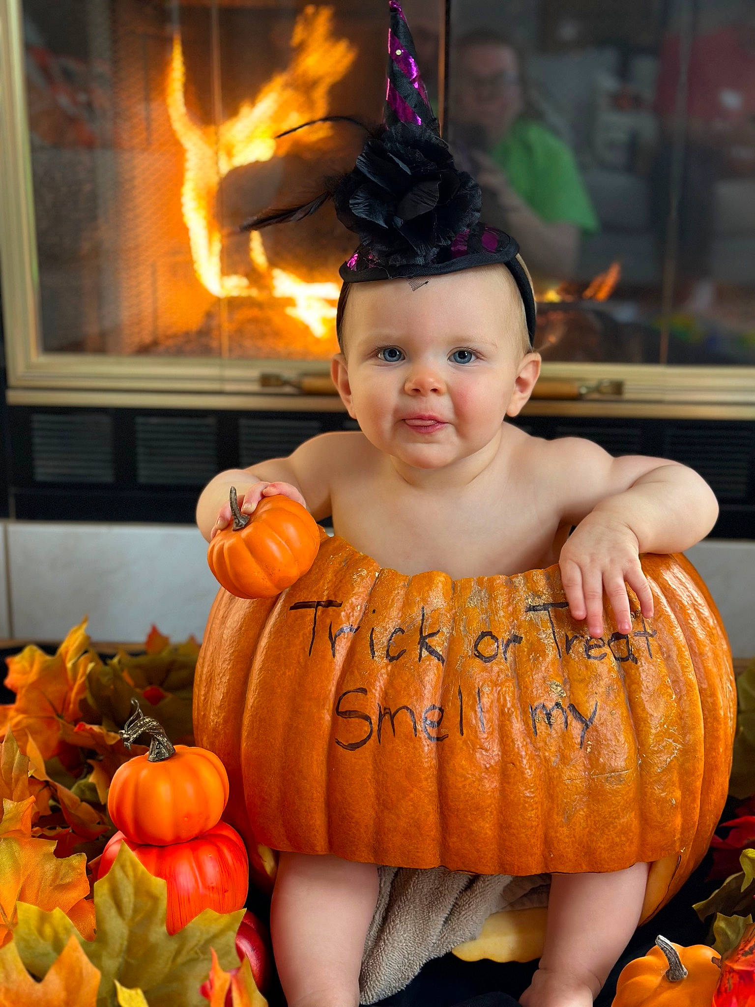 Sally is registered to the contest to win money with this photo: baby, baby_toddler_clothing, calabaza, child, cucurbita, fruit, gourd, happy, headwear, heat, joy, local_food, natural_foods, orange, peach, person, plant, pumpkin, squash, toddler
