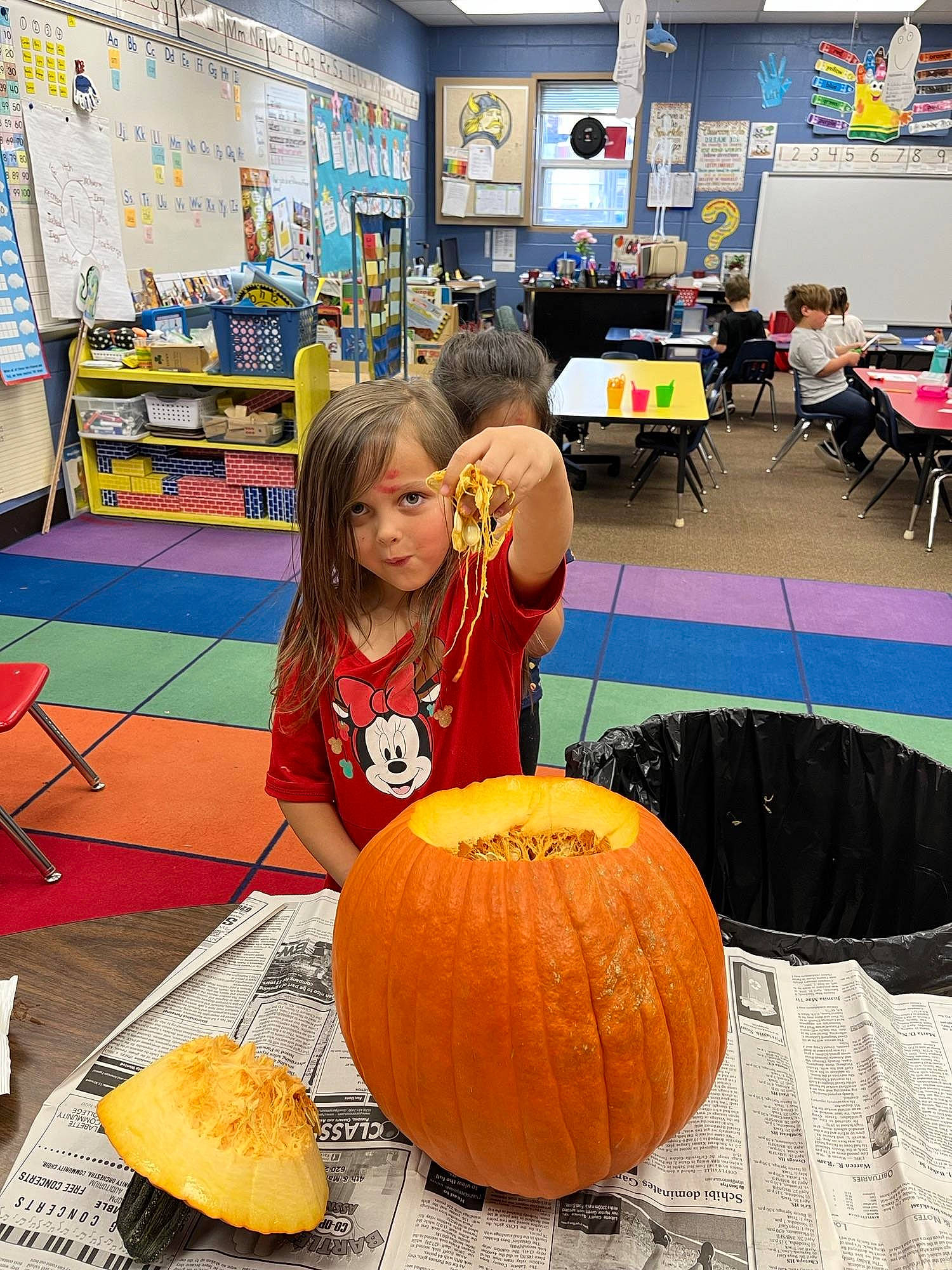 Addisyn joined the competition — help win amazing prizes! art, calabaza, chair, cucurbita, flooring, fun, gourd, leisure, natural_foods, orange, person, photograph, plant, pumpkin, snapshot, squash, table, toddler, vegetable, winter_squash