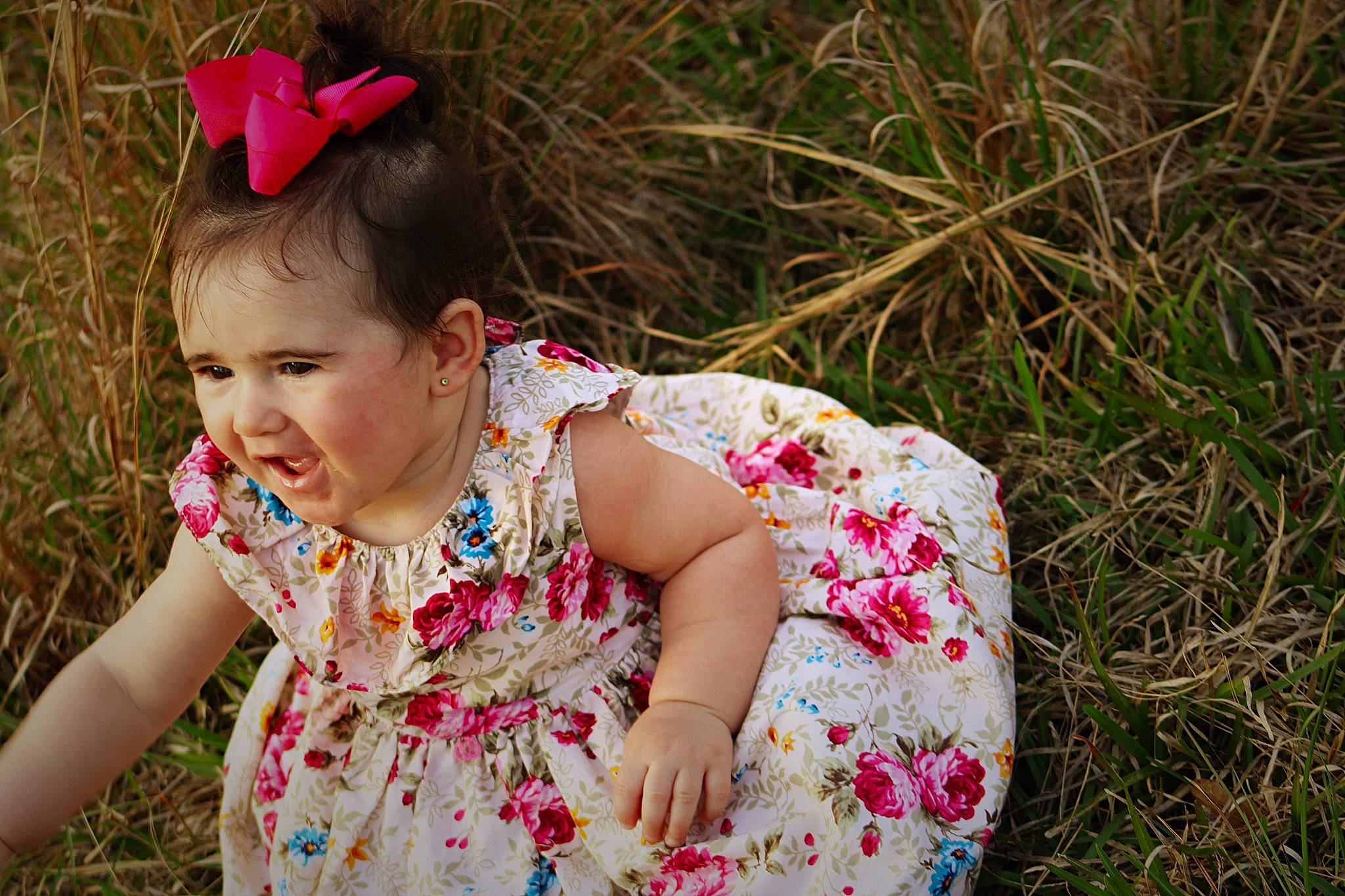 Shaylynn is registered to the contest to win money with this photo: baby_toddler_clothing, child, day_dress, dress, facial_expression, grass, grass_family, grassland, happy, leaf, lip, magenta, meadow, pattern, people_in_nature, person, pink, plant, skin, toddler