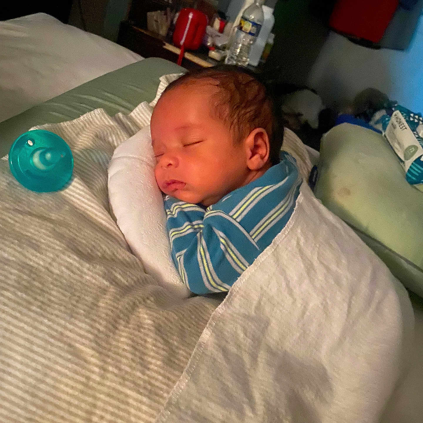 Amari is registered to the contest to win money with this photo: architecture, baby, bed, bedroom, blanket, building, clothing, cushion, face, furniture, head, homedecor, hospital, indoors, newborn, person, photography, portrait, room, sleeping