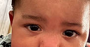 Jeremiah joined the competition — help win amazing prizes! baby, child, chubby_cheeks, close_up, curious, cute, expression, eyebrows, eyes, face, hair, indoors, infant, jacket, mouth, nose, portrait, puma, skin, young_child