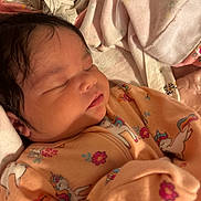 Liahna is registered to the contest to win money with this photo: baby, bedtime, blanket, cheek, closed_eyes, cozy, cute, face, hair, indoors, infant, mouth, newborn, pajamas, portrait, resting, sleep, sleeping, soft_fabric, unicorn