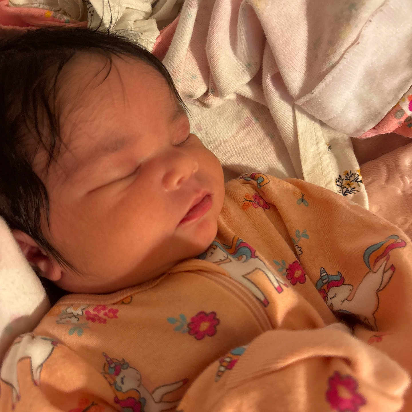 Liahna is registered to the contest to win money with this photo: baby, bedtime, blanket, cheek, closed_eyes, cozy, cute, face, hair, indoors, infant, mouth, newborn, pajamas, portrait, resting, sleep, sleeping, soft_fabric, unicorn