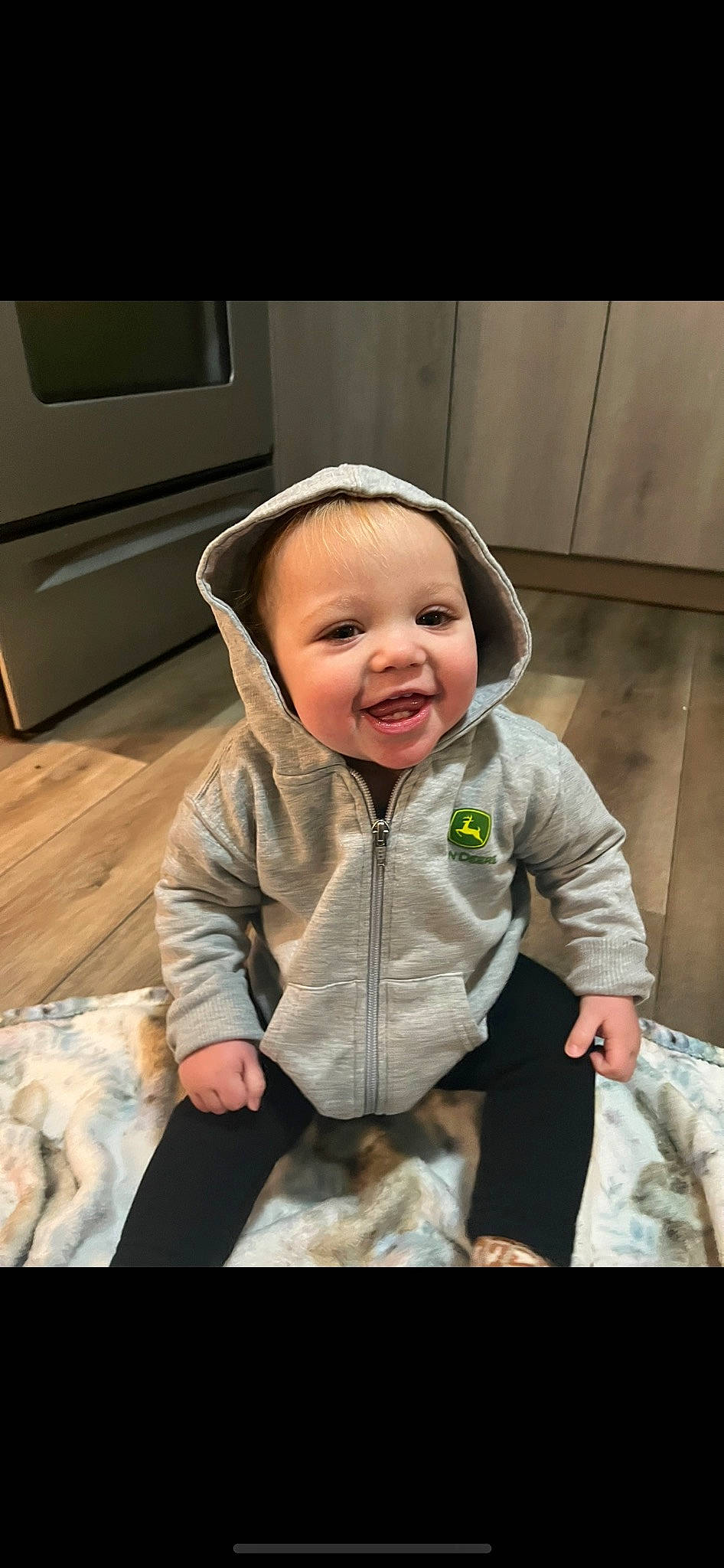 Ellie joined the competition — help win amazing prizes! baby, baby_toddler_clothing, cheek, child, comfort, eye, flash_photography, flooring, fun, happy, head, laugh, nose, person, product, sitting, skin, sleeve, smile, toddler