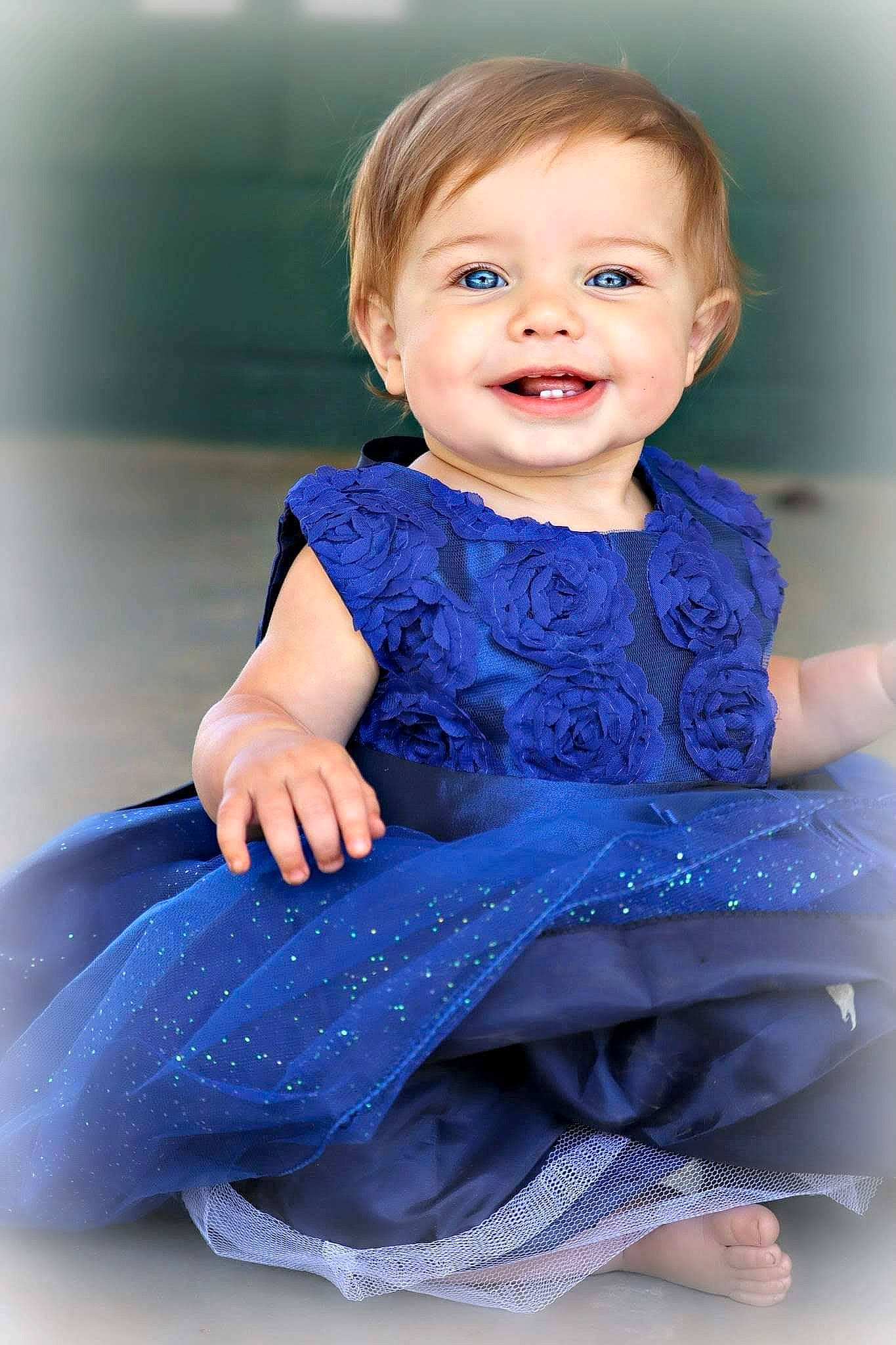Gracelynn joined the competition — help win amazing prizes! azure, baby_toddler_clothing, child, dress, electric_blue, face, facial_expression, flash_photography, gesture, hairstyle, happy, iris, joy, neck, one_piece_garment, person, purple, shoulder, skin, sleeve