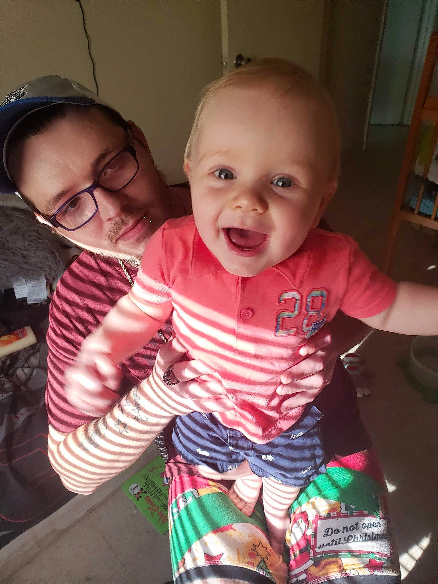 Cash is registered to the contest to win money with this photo: baby, cheek, child, cool, electronic_device, eye, face, facial_expression, fun, glasses, happy, head, iris, nose, organ, person, selfie, skin, smile, toddler