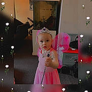 Oceanna is registered to the contest to win money with this photo: carpet, child, costume, cute, dress, fish_tank, furniture, girl, happy, indoor, living_room, magic, person, pink, play, portrait, tiara, toy, wand, wings
