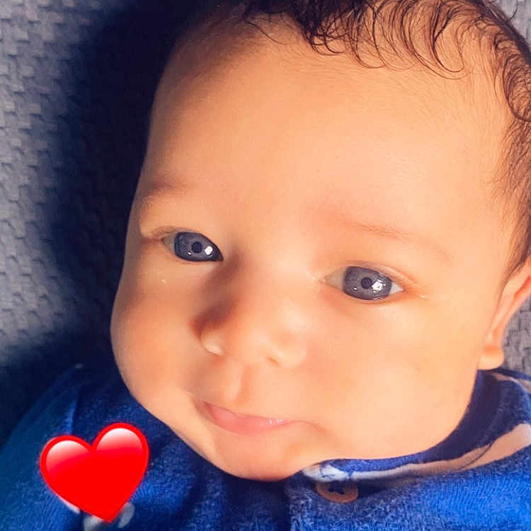 Jovanni joined the competition — help win amazing prizes! accessories, baby, bodypart, clothing, coat, earring, face, finger, hand, happy, head, heart, jacket, jeans, jewelry, pants, person, photography, portrait, smile