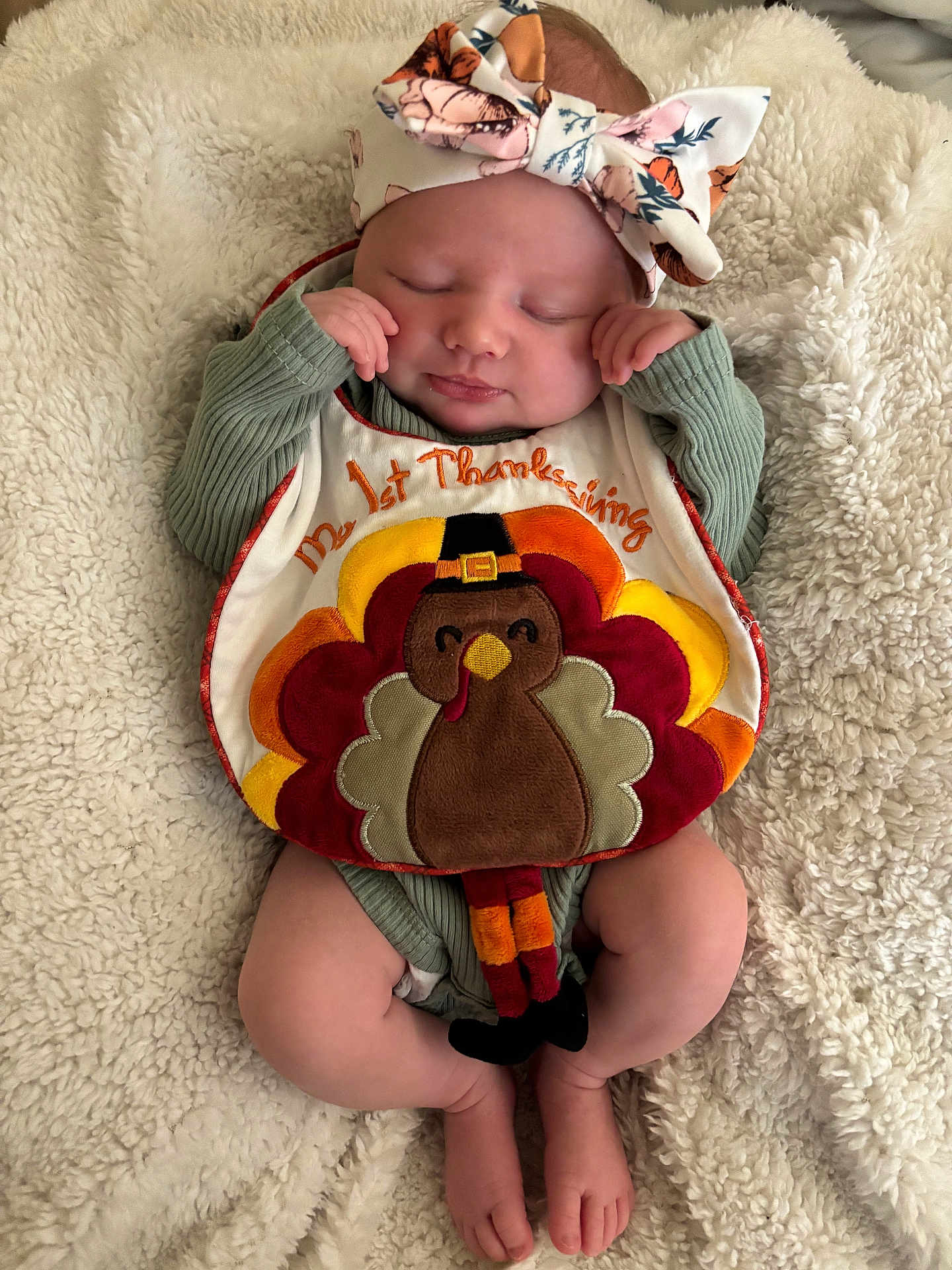 Macayla joined the competition — help win amazing prizes! baby, infant, sleeping, bib, thanksgiving, turkey, headband, floral, blanket, soft, cute, holiday, festive, clothing, person, newborn, peaceful, resting, legs, feet
