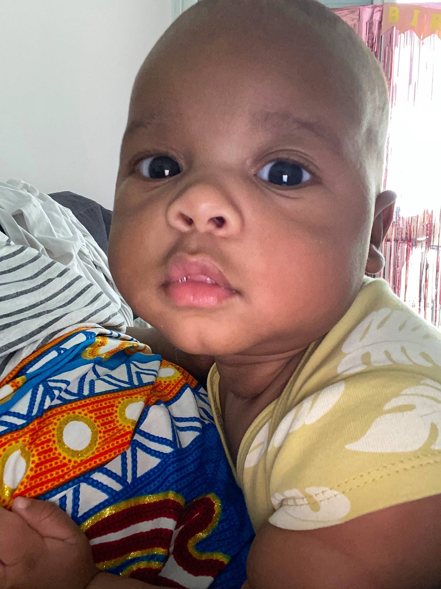 Arly participe au concours pour gagner de l'argent avec cette photo : baby, baby_products, baby_toddler_clothing, cheek, child, comfort, curtain, eye, eyelash, fun, happy, iris, mouth, nail, neck, nose, person, sitting, skin, smile