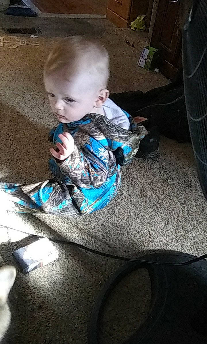 Lance is registered to the contest to win money with this photo: baby, child, person, play, sitting, toddler