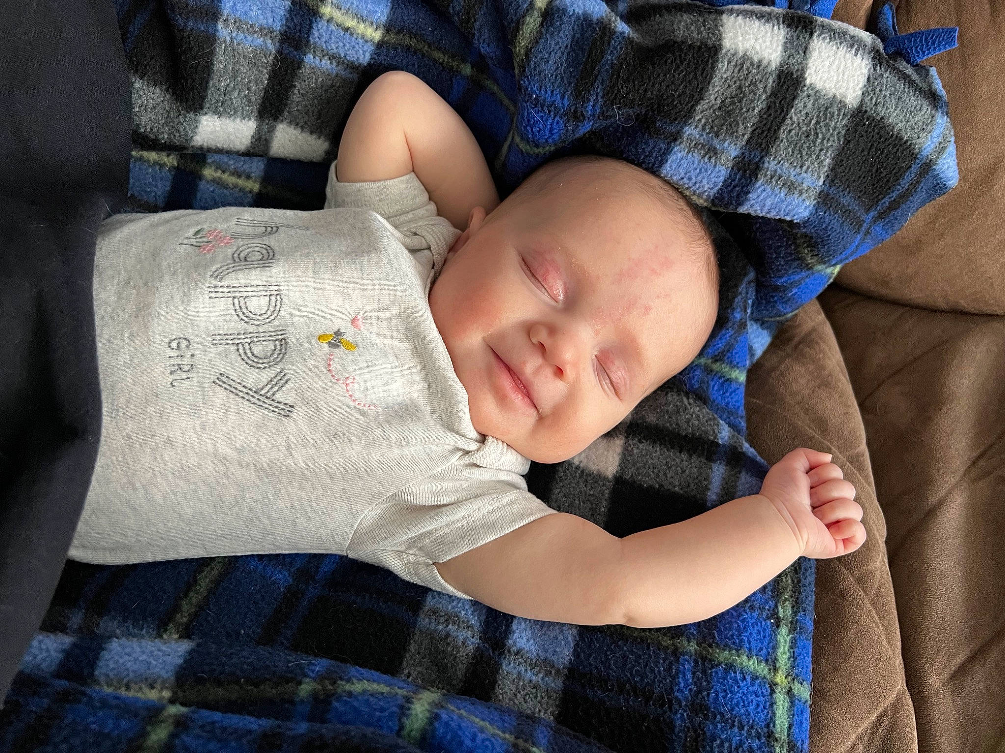 Payton is registered to the contest to win money with this photo: baby, baby_products, baby_toddler_clothing, blue, child, comfort, electric_blue, finger, grass, hand, linens, pattern, person, plaid, sitting, skin, sleeve, tartan, textile, toddler