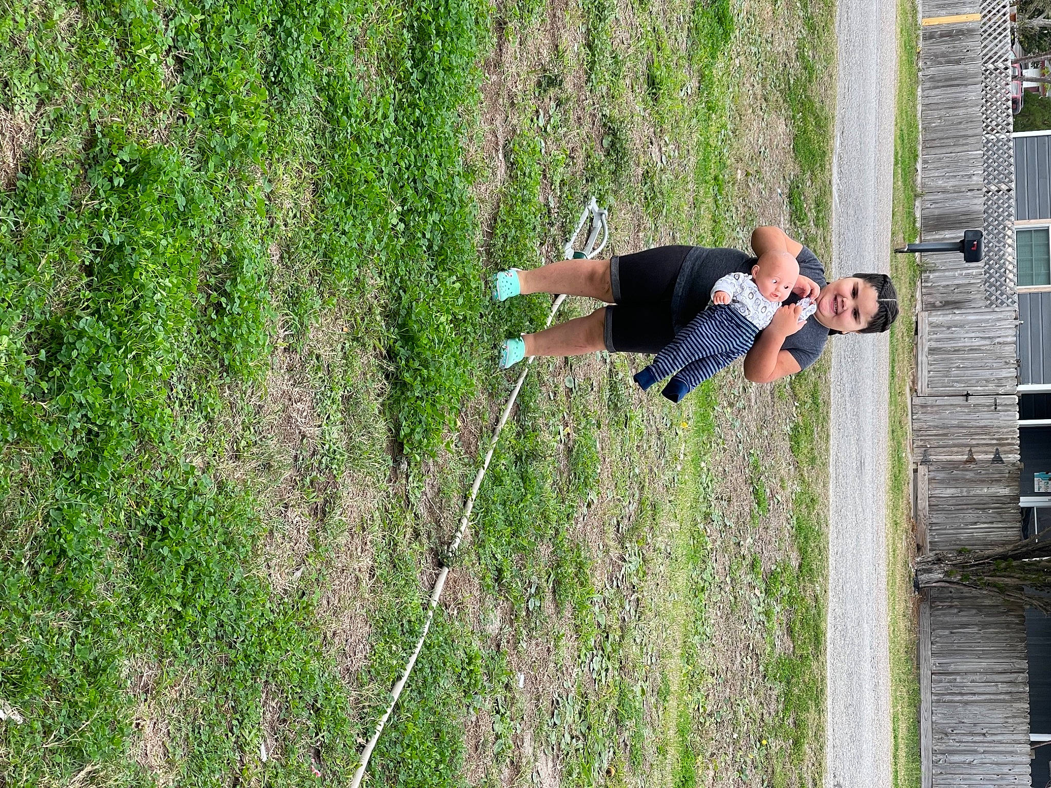 Leighla is registered to the contest to win money with this photo: adventure, fun, grass, grass_family, grassland, happy, human_body, joy, landscape, leisure, people_in_nature, person, plant, recreation, shorts, shrub, sunglasses, tree, vegetation, water