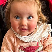 Cléo a rejoint le concours — aidez-le/la à gagner de superbes lots ! child, baby, infant, blue_eyes, rosy_cheeks, ponytail, hair_tie, bib, sweater, pink_clothing, stroller, seat, hands, toy, smile, portrait, close_up, cute, wide_eyes, soft_texture