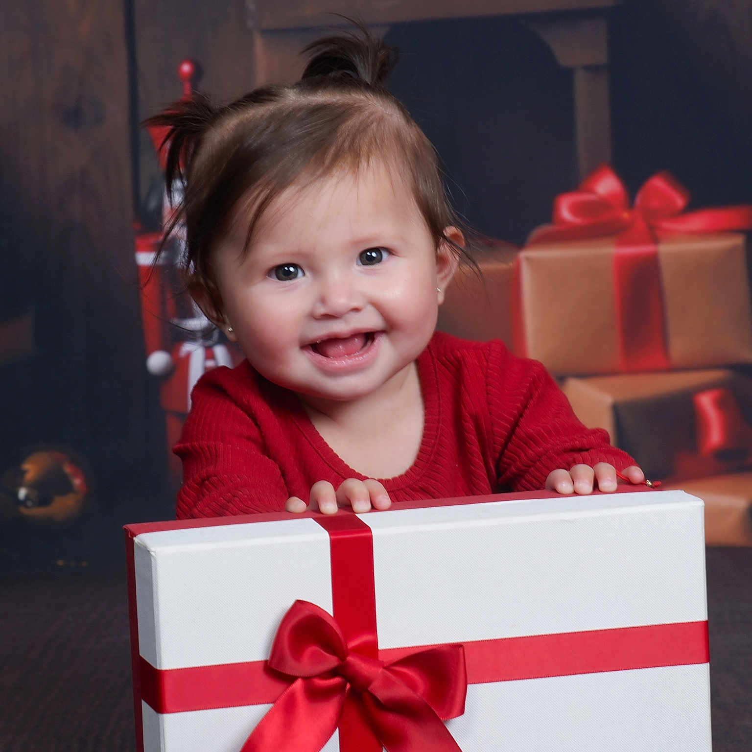 Anniliah joined the competition — help win amazing prizes! baby, celebration, child, christmas, clothing, cute, festive, gift, happy, holiday, holiday_decor, indoors, joyful, pigtails, portrait, present, red_ribbon, smiling, wrapped_presents, young_child