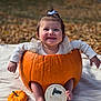 Anniliah is registered to the contest to win money with this photo: baby, pumpkin, infant, smiling, outdoor, blanket, fall, autumn, cute, child, orange, white_clothing, bow, feet, happy, nature, seasonal, portrait, grass, sign