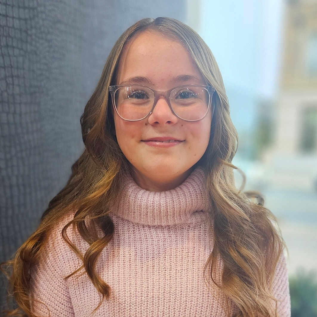 Sadie-mae is registered to the contest to win money with this photo: accessories, adult, blonde, bodypart, clothing, dimples, face, female, glasses, hair, happy, head, knitwear, neck, person, photography, portrait, smile, sweater, woman
