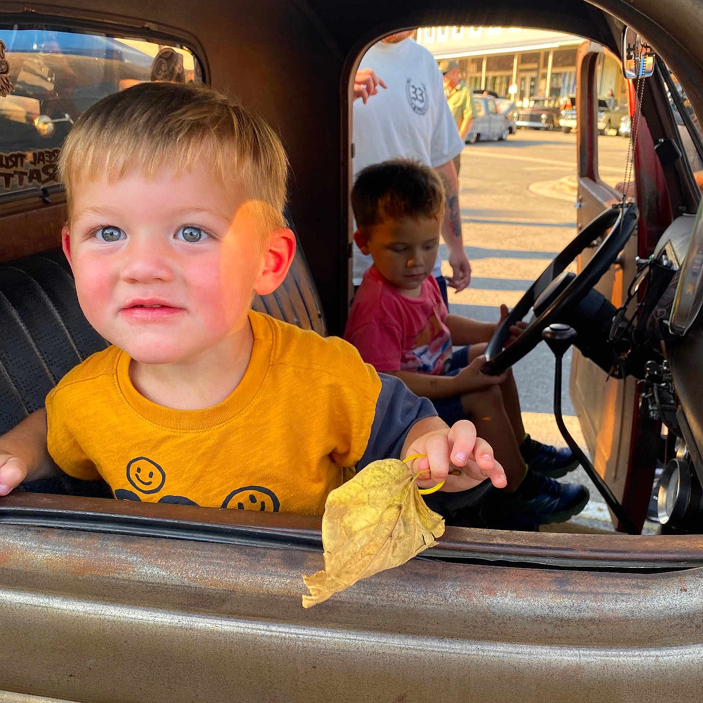 Kash is registered to the contest to win money with this photo: alloywheel, baby, boy, car, carwheel, child, clothing, face, footwear, hat, head, machine, male, person, photography, portrait, shoe, spoke, transportation, vehicle