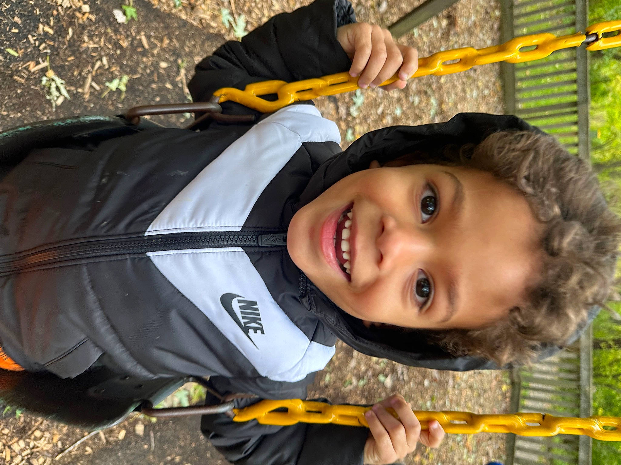 Kobe joined the competition — help win amazing prizes! child, fence, fun, grass, green, happy, joy, laugh, leisure, outdoor_play_equipment, people_in_nature, person, personal_protective_equipment, recreation, smile, toddler, travel, tree, vacation, wood