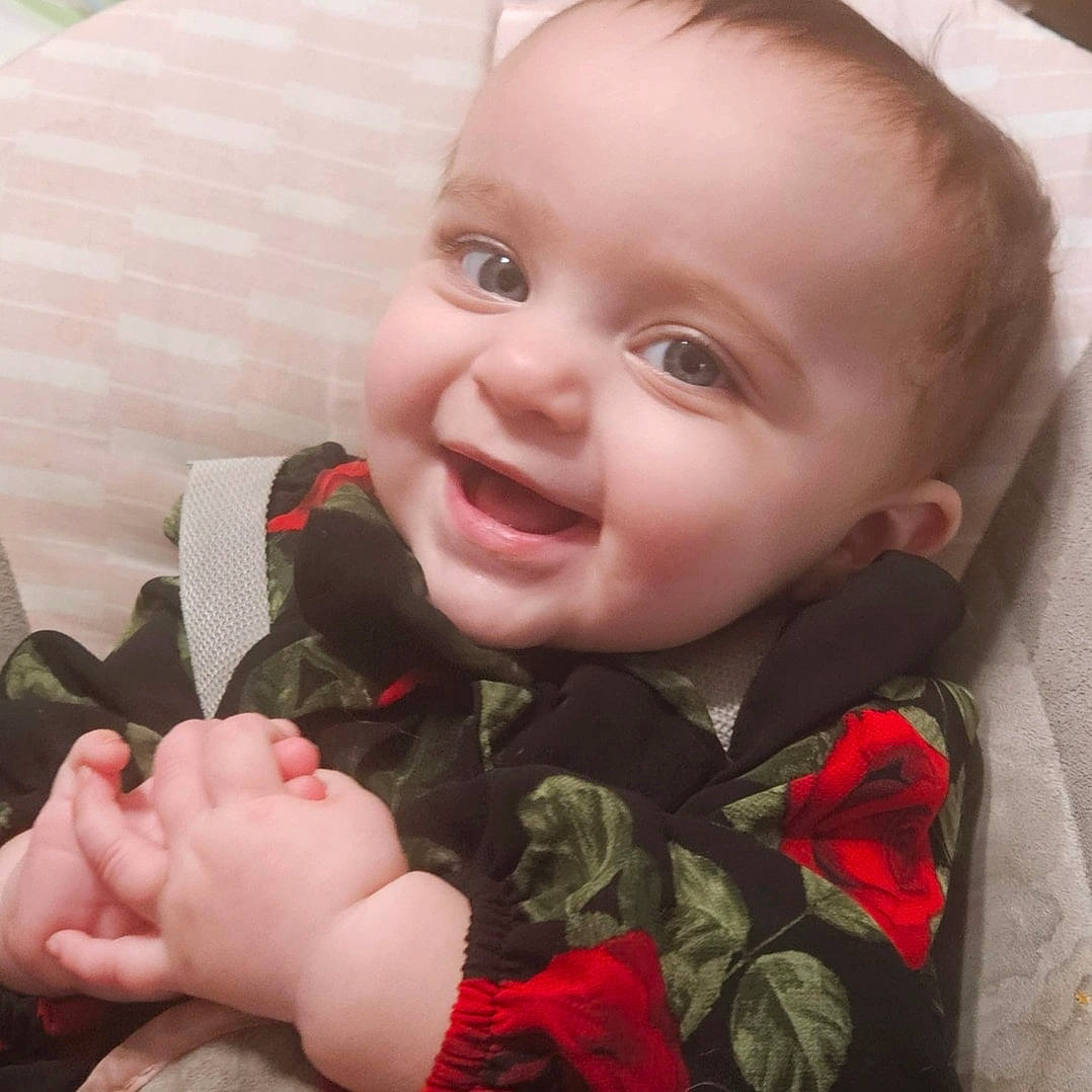 Celeste is registered to the contest to win money with this photo: baby, baby_toddler_clothing, cheek, chin, eye, eyebrow, finger, gesture, happy, head, human, iris, joy, lip, mouth, nose, organ, person, pink, skin