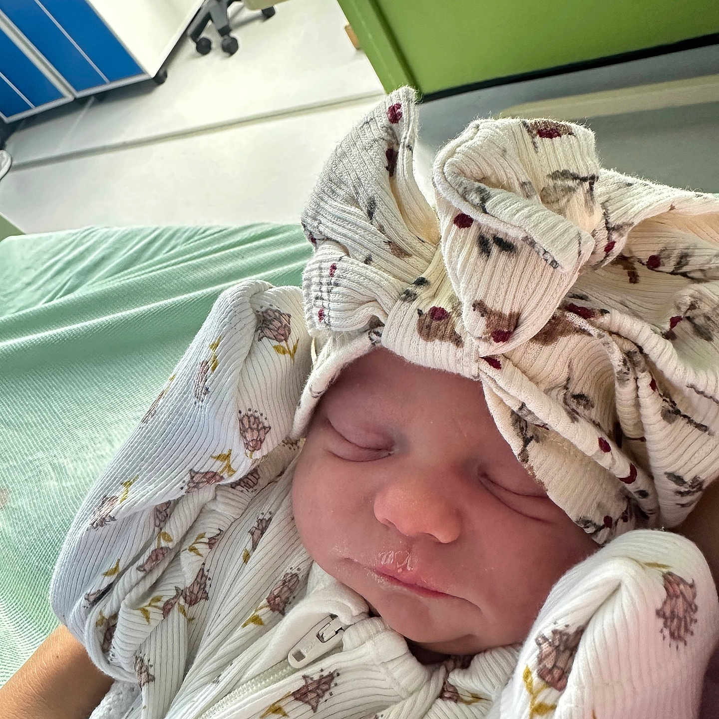 Esmerelda-Rose joined the competition — help win amazing prizes! baby, bed, blanket, closeup, clothing, cozy, cute, face, floral_pattern, hands, headband, hospital, infant, newborn, onesie, peaceful, person, portrait, sleeping, soft_light