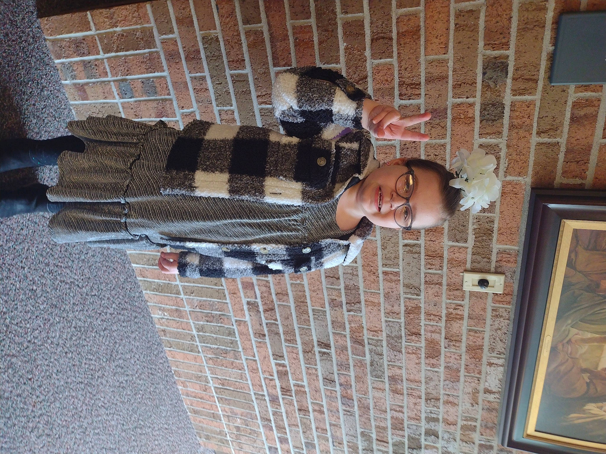 Annie is registered to the contest to win money with this photo: brick, brickwork, building, building_material, composite_material, facade, flooring, pattern, person, picture_frame, visual_arts, window, wood