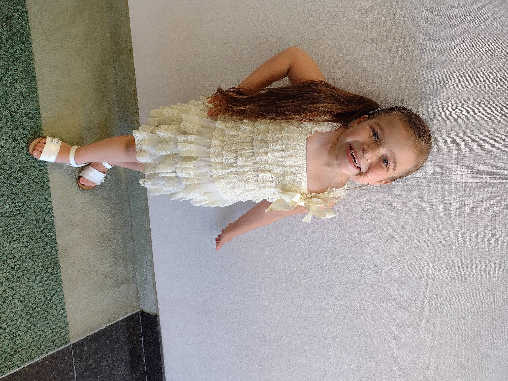 Annie is registered to the contest to win money with this photo: baby_toddler_clothing, cocktail_dress, day_dress, dress, elbow, embellishment, fashion_design, flooring, hardwood, human_leg, joy, knee, one_piece_garment, person, pink, room, sleeve, thigh, toddler, waist